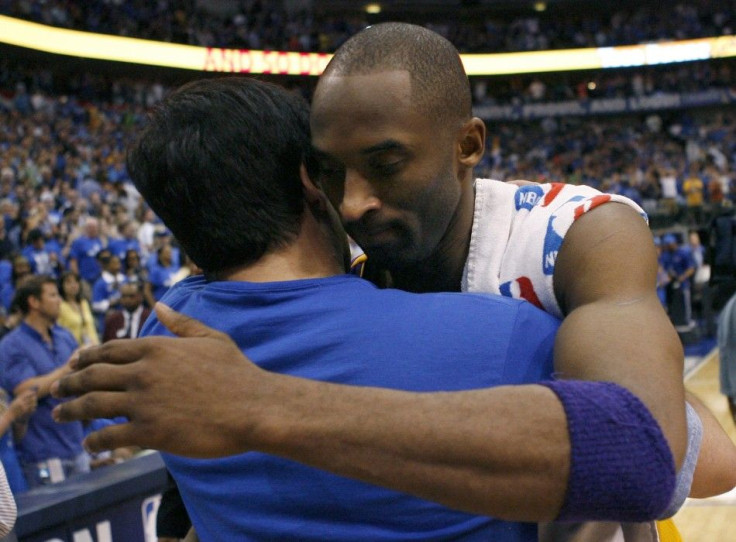 Los Angeles Lakers Kobe Bryant hugs Dallas Mavericks owner Mark Cuban