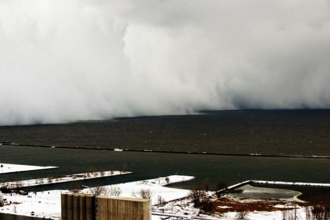 A lake-effect snow storm with freezing temperatures produces a wall of snow travelling over Lake Erie into Buffalo, New York. November 18, 2014. A whirlpool of frigid, dense air known as a &quot;polar vortex&quot; descended Tuesday into much of the Northe