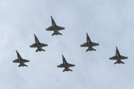 CF-18 Hornet fighter jets depart from 4 Wing Cold Lake, Alberta, October 21, 2014, in this Royal Canadian Air Force handout photo provided on October 22, 2014. The jets are part of the Canadian Armed Forces? contribution to coalition assistance to securit