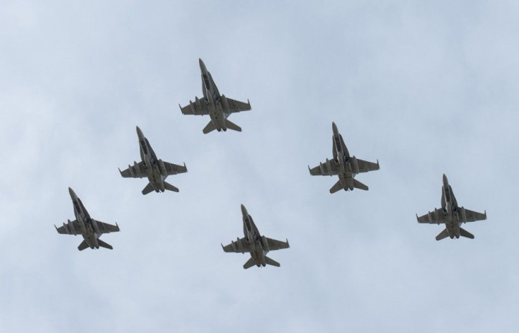 CF-18 Hornet fighter jets depart from 4 Wing Cold Lake, Alberta, October 21, 2014, in this Royal Canadian Air Force handout photo provided on October 22, 2014. The jets are part of the Canadian Armed Forces? contribution to coalition assistance to securit