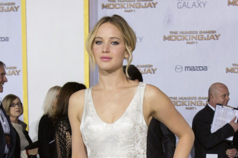 Cast member Jennifer Lawrence poses at the premiere of &quot;The Hunger Games: Mockingjay - Part 1&quot; in Los Angeles, California November 17, 2014. The movie opens in the U.S. on November 21.