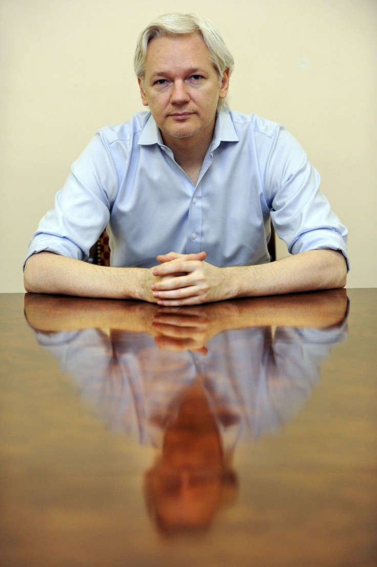 Wikileaks founder Julian Assange speaks to the media inside the Ecuadorian Embassy in London June 14, 2013.