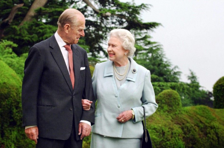 Britain&#039;s Queen Elizabeth and Prince Philip, the Duke of Edinburgh walk at Broadlands in Romsey, southern England in this undated photograph taken in 2007.