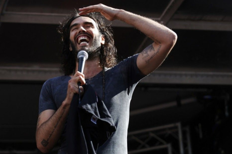 Comedian and presenter Russell Brand speaks during an anti-austerity rally in Parliament Square in London June 21, 2014.