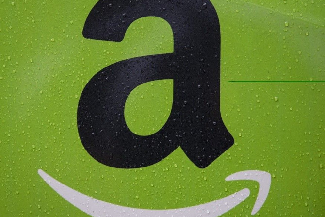The Amazon.com, Inc. logo is seen on the side of a delivery truck in Brooklyn