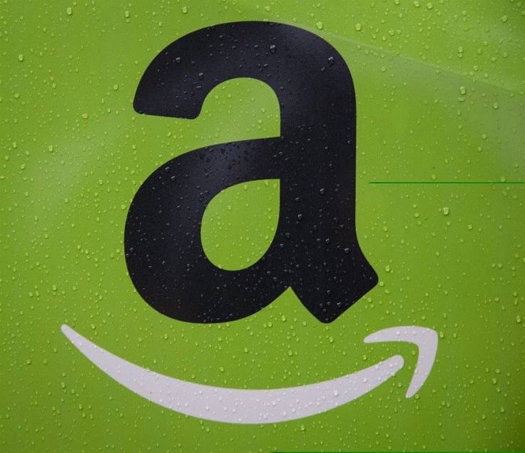 The Amazon.com, Inc. logo is seen on the side of a delivery truck in Brooklyn