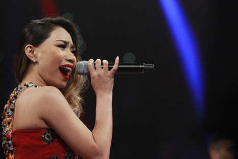 Jessica Sanchez sings the Philippine National Anthem before the welterweight title fight between Manny Pacquiao of the Philippines and Timothy Bradley of the U.S. at the MGM Grand Garden Arena in Las Vegas, Nevada April 12, 2014. Pacquiao won by unanimous