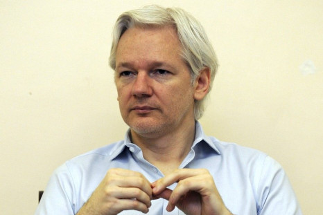 Wikileaks founder Julian Assange speaks to the media inside the Ecuadorian Embassy in London June 14, 2013.