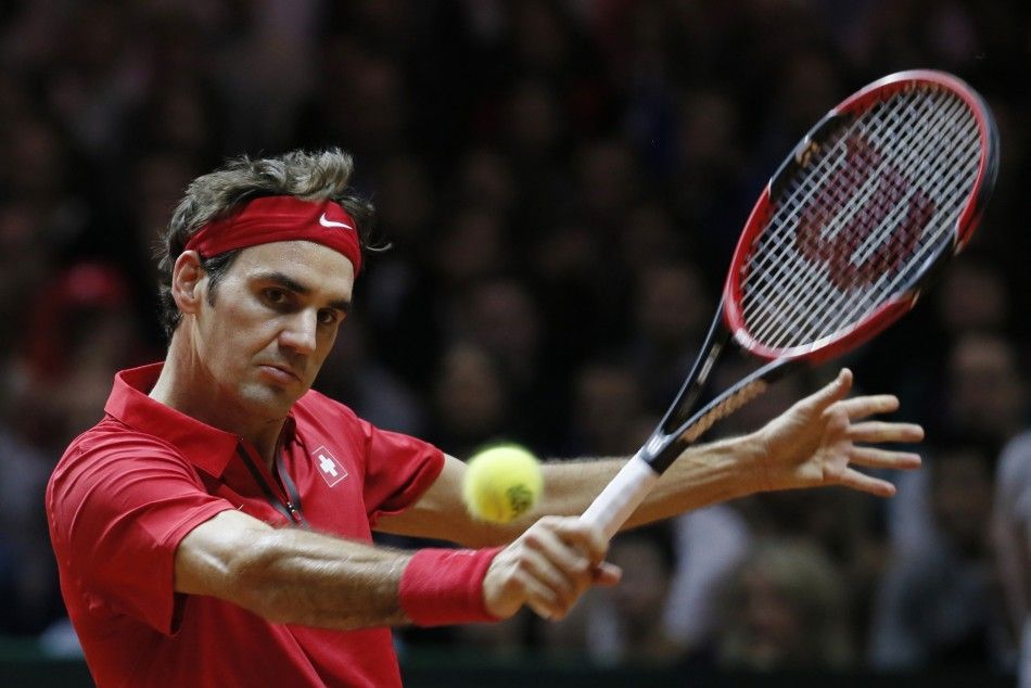Switzerlands Roger Federer returns the ball 