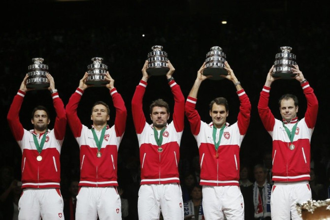 Switzerland's team members, from L-R, Michael Lammer, Marco Chiudinelli, Stanislas Wawrinka, Roger Federer and Davis Cup tennis team captain Severin Luthi 