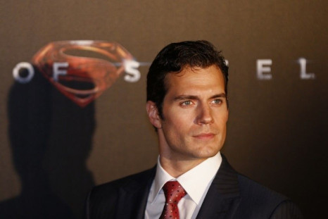 Cast member Henry Cavill poses for pictures after his arrival to the Australian premiere of &quot;Man of Steel&quot;