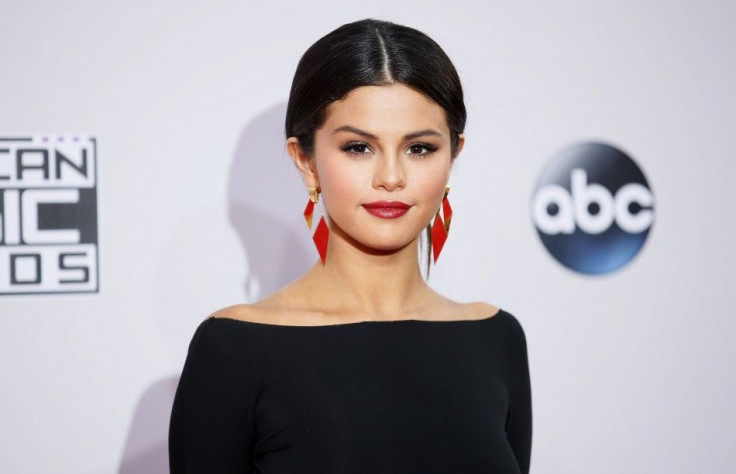 Singer Selena Gomez arrives at the 42nd American Music Awards in Los Angeles