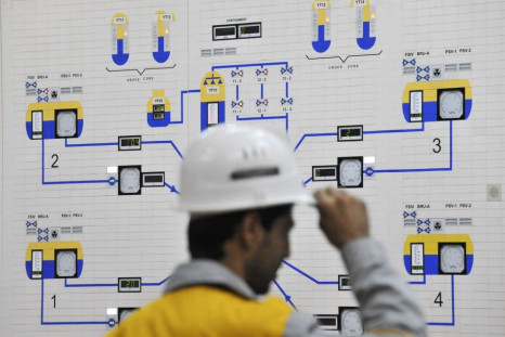 An Iranian operator monitors the nuclear power plant unit in Bushehr, about 1,215 km (755 miles) south of Tehran, November 30, 2009. Russia plans to start up Iran&#039;s first nuclear power station in March 2010 to coincide with the Iranian New Year, two 