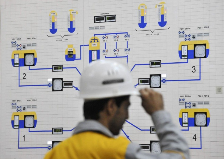 An Iranian operator monitors the nuclear power plant unit in Bushehr, about 1,215 km (755 miles) south of Tehran, November 30, 2009. Russia plans to start up Iran's first nuclear power station in March 2010 to coincide with the Iranian New Year, two