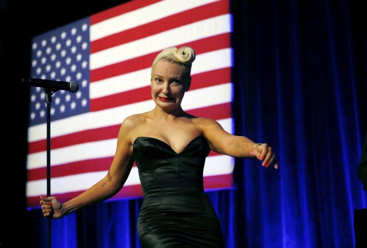 Singer Sia walks from the stage after performing at the  Democratic National Committee&#039;s (DNC) annual Lesbian, Gay, Bisexual and Transgender (LGBT) gala in New York June 17,  2014.  U.S. President Barack Obama spoke after Sia performed.  REUTERS/Kevi