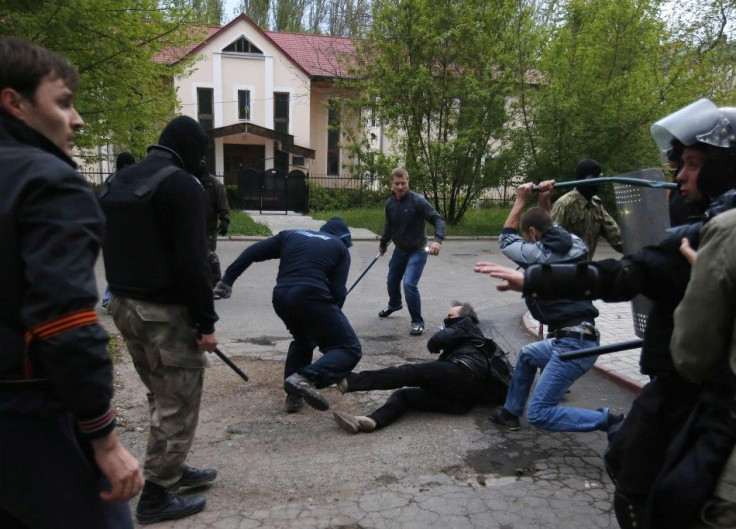 Pro-Russian Protesters Attack A Pro-Ukranian Protester During A Pro-Ukrainian Rally In The Eastern City Of Donetsk