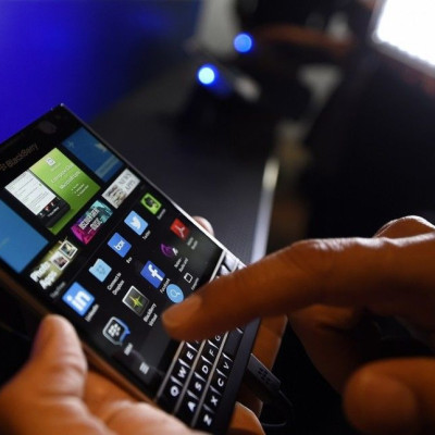 A BlackBerry Passport smartphone is shown at its official launching event in Toronto, September 24, 2014. BlackBerry launched an unconventional new smartphone dubbed the Passport on Wednesday, as it embarked on potentially the most critical phase of its l