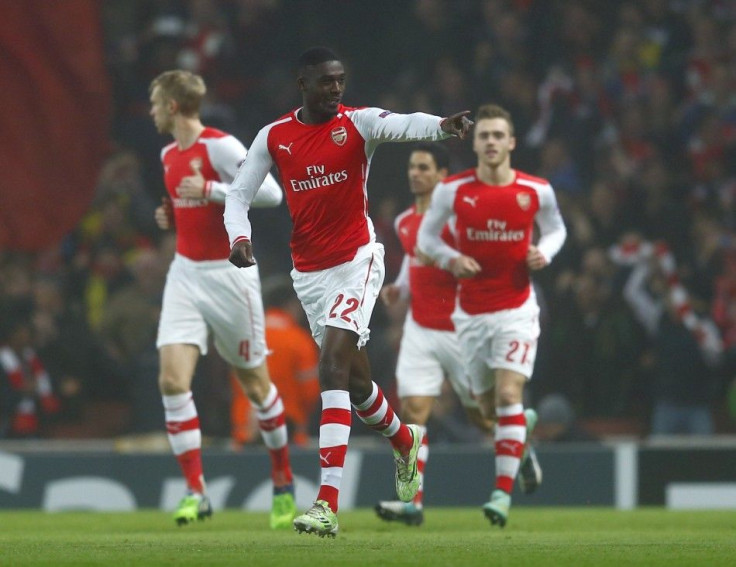 Arsenal&#039;s Yaya Sanogo (C) celebrates with his team mates after scoring a goal against Borussia Dortmund during their Champions League group D soccer match in London November 26, 2014.