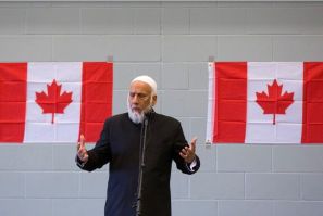 Imam Syed Soharwardy pauses while talking to his fellow Muslims during a show for support against the attacks on Canadian soldiers