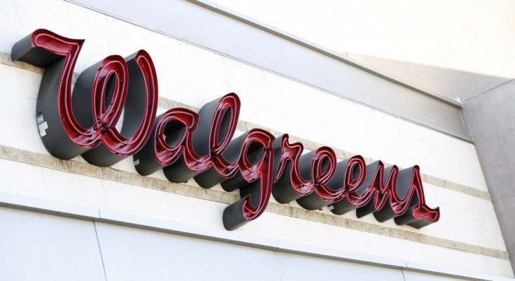 The sign of a Walgreens store is pictured in Pasadena, California December 20, 2013. Walgreen Co reported higher quarterly sales on Friday, but an increase in promotions and a slowdown in the introduction of higher-profit generic drugs cut into its gross 