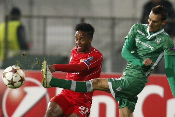 Yordan Minev (R) of Ludogorets challanges Raheem Sterling of Liverpool during their Champions League Group B soccer match at Vassil Levski stadium in Sofia, November 26, 2014.