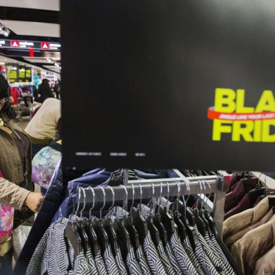 A shopper looks at items on sale inside of a JC Penney store during Black Friday sales in New York, November 29, 2013. Black Friday, the day following Thanksgiving Day holiday, has traditionally been the busiest shopping day in the United States.