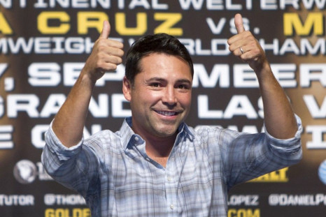 Oscar De La Hoya, president of Golden Boy Promotions, gives a thumbs up during an official weigh-in at the MGM Grand Garden Arena in Las Vegas, Nevada September 14, 2012. REUTERS/Steve Marcus