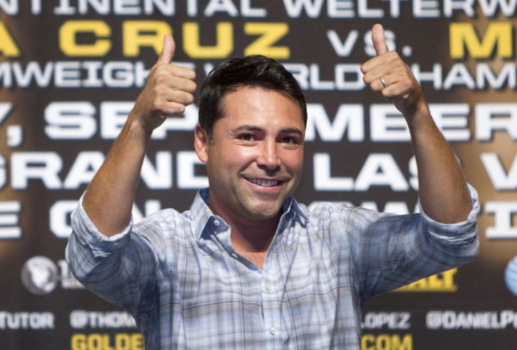 Oscar De La Hoya, president of Golden Boy Promotions, gives a thumbs up during an official weigh-in at the MGM Grand Garden Arena in Las Vegas, Nevada September 14, 2012. REUTERS/Steve Marcus