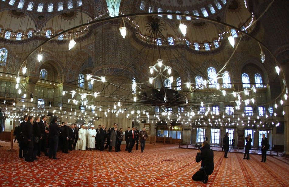 Pope Francis is shown Sultan Ahmet mosque, popularly known as the Blue Mosque by Mufti of Istanbul, Rahmi Yaran, during his visit to Istanbul November 29, 2014. Pope Francis began a visit to Turkey on Friday with the delicate mission of strengthening ties