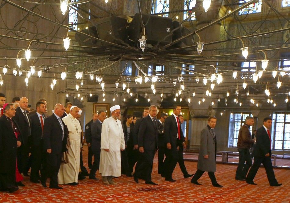 Pope Francis is shown Sultan Ahmet mosque, popularly known as the Blue Mosque by Mufti of Istanbul, Rahmi Yaran C during his visit to Istanbul November 29, 2014. Pope Francis began a visit to Turkey on Friday with the delicate mission of strengthening t