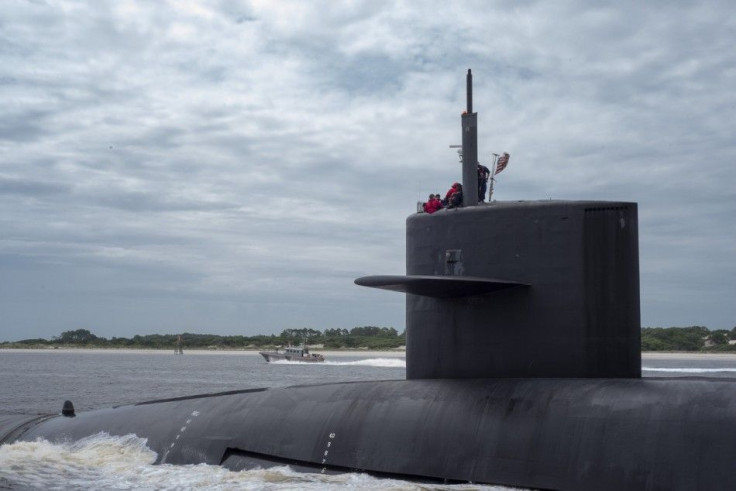 The Ohio-class ballistic missile submarine USS Tennessee transits the St. Marys Channel as it departs Naval Submarine Base Kings Bay, Georgia in this February 6, 2013 handout photo. The Tennessee and 13 other Ohio-class submarines are critical elements of