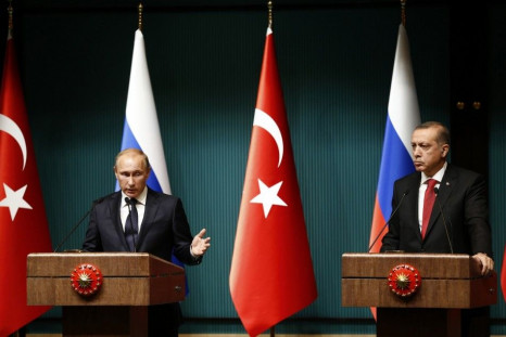 Russia&#039;s President Vladimir Putin and Turkey&#039;s President Tayyip Erdogan attend a news conference at the Presidential Palace in Ankara December 1, 2014. REUTERS/Umit Bektas