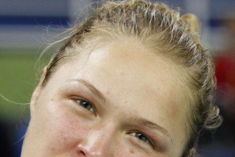 Ronda Rousey of the U.S. kisses her medal after winning the women&#039;s -70 kg judo bronze medal contest A at the Beijing 2008 Olympic Games, August 13, 2008.
