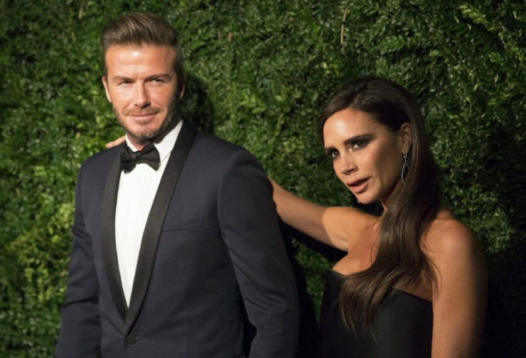 Former British Soccer Player David Beckham And His wife, Fashion Designer Victoria Beckham During The Evening Standard Theatre Awards In London