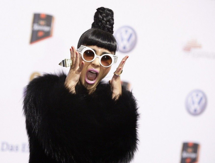 British artist Natalia Kills poses as she arrives on the red carpet for the Echo Music Awards ceremony in Berlin March 24, 2011. The German Phonographic Academy honours artists from all over the world in 25 categories. REUTERS/Thomas Peter