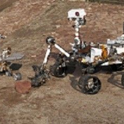 Three Generations of Rovers are pictured in the  Mars Test Yard at NASA&#039;s Jet Propulsion Laboratory, Pasadena, California in this undated handout photograph. Front and left is the flight spare for the first Mars rover, Sojourner, which landed on Mars