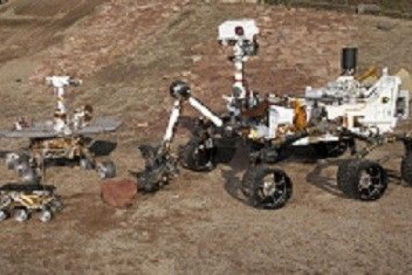 Three Generations of Rovers are pictured in the  Mars Test Yard at NASA&#039;s Jet Propulsion Laboratory, Pasadena, California in this undated handout photograph. Front and left is the flight spare for the first Mars rover, Sojourner, which landed on Mars