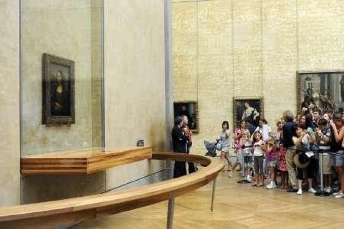 Italian painter Leonardo da Vinci's famed portrait Mona Lisa at the Louvre Museum in Paris