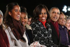 U.S. President Barack Obama And His Family, Daughters Malia (L) and Sasha (2nd L), first lady Michelle Obama (C) 