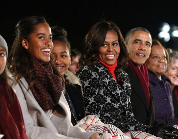 U.S. President Barack Obama And His Family, Daughters Malia (L) and Sasha (2nd L), first lady Michelle Obama (C) 