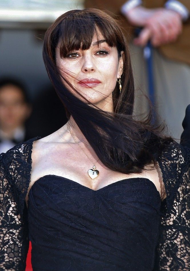 Cast member Monica Bellucci poses on the red carpet as she arrives for the screening of the film quotLe meravigliequot 