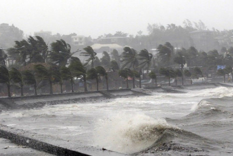Strong winds and waves brought by Typhoon Hagupit pound the seawall in Legazpi City, Albay province southern Luzon December 7, 2014. The powerful typhoon tore through the central Philippines on Sunday, bringing howling winds that toppled trees and power a