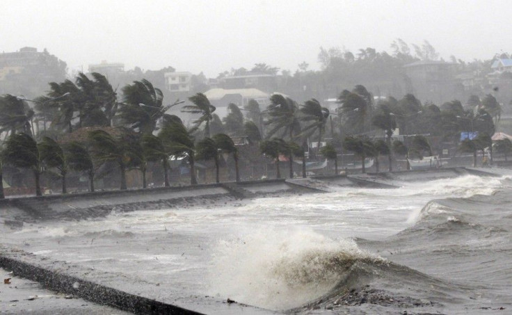 Strong winds and waves brought by Typhoon Hagupit pound the seawall in Legazpi City, Albay province southern Luzon December 7, 2014. The powerful typhoon tore through the central Philippines on Sunday, bringing howling winds that toppled trees and power a