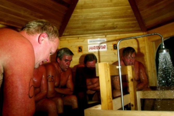 Male competitors sit in a sauna at the Sauna World Championships in Heinola, Finland August 9, 2008. The aim of the competition is to find out who can endure sitting in the sauna for the longest period of time.