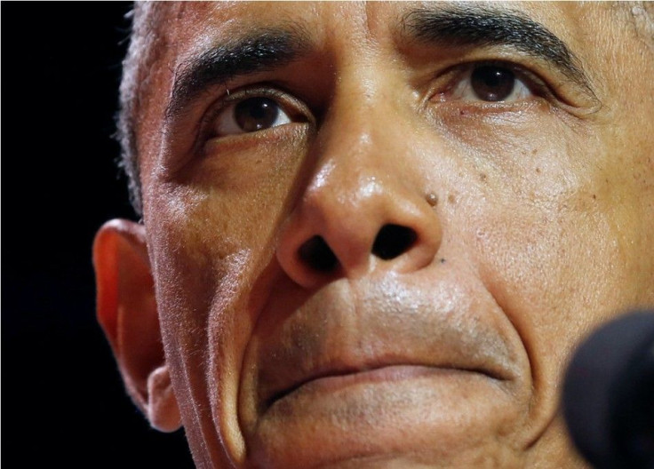 U.S. President Barack Obama looks on during the Summit on College Opportunity