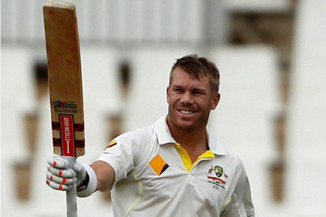 Australia&#039;s David Warner celebrates his hundred century during the third day of their cricket test match against South Africa