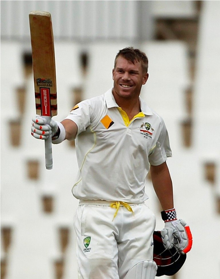Australia&#039;s David Warner celebrates his hundred century during the third day of their cricket test match against South Africa