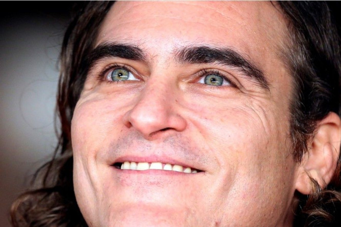 Cast member Joaquin Phoenix arrives for a red carpet event for the movie &quot;Her&quot; at the Rome Film Festival