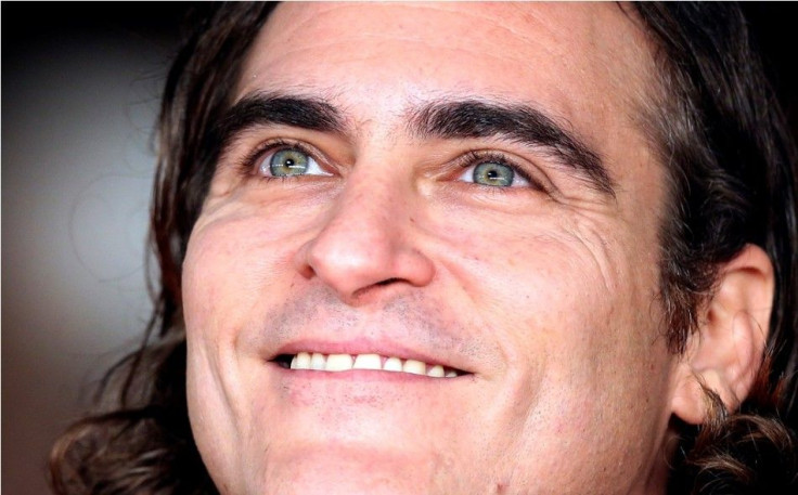 Cast member Joaquin Phoenix arrives for a red carpet event for the movie &quot;Her&quot; at the Rome Film Festival