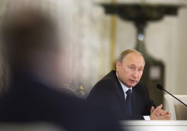 Russia's President Vladimir Putin speaks during the Presidential Council on Science and Education at the State Hermitage Museum in St. Petersburg, December 8, 2014. Putin said on Monday that Russia should make a leap in developing its fundamental sci